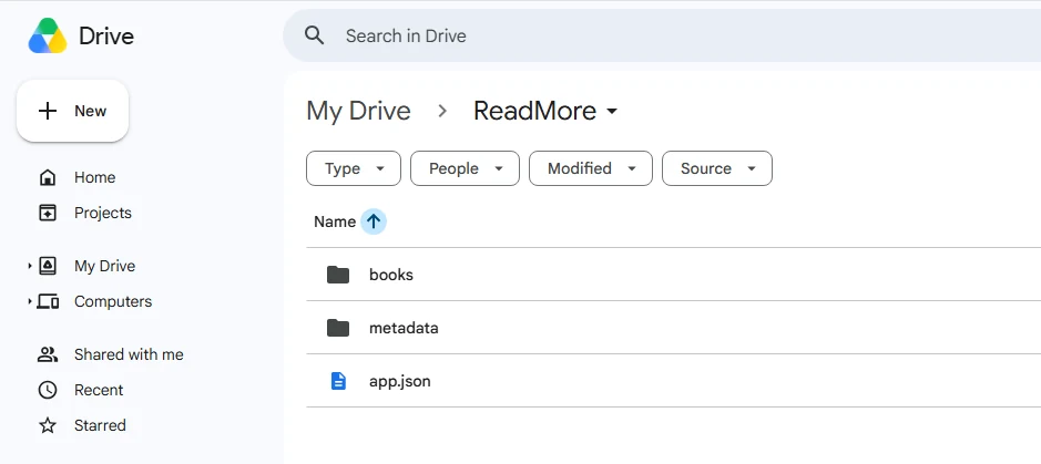Google Drive web UI showing the My Drive/ReadMore/ folder with books/ and metadata/ subfolders populated.